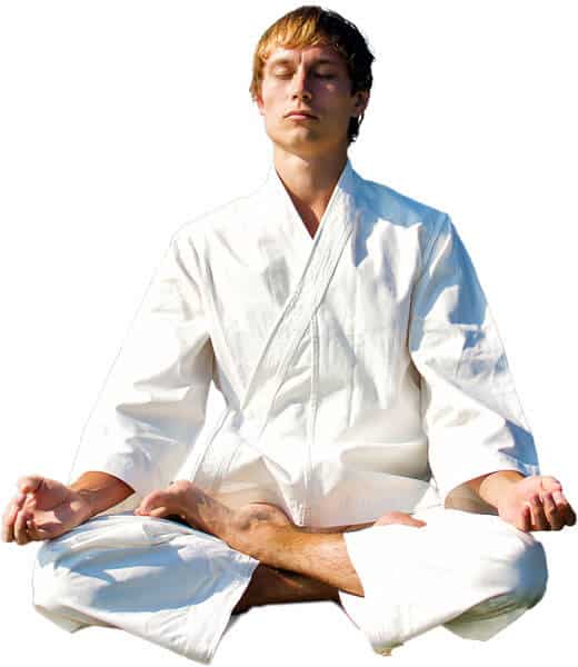 Martial Arts Lessons for Adults in Fort Dodge IA - Young Man Thinking and Meditating in White